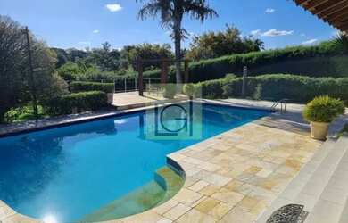 Imagem: A casa em condomínio possui 5 Dormitórios, 5 Banheiros, 5