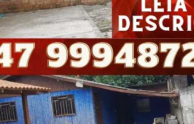 Imagem: A casa possui 2 Dormitórios, 1 Banheiro, 2 Vagas na garagem