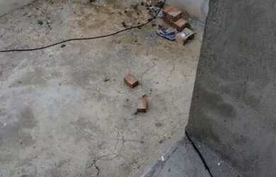 Imagem: A casa possui 3 Dormitórios, 2 Banheiros, 4 Vagas na garagem