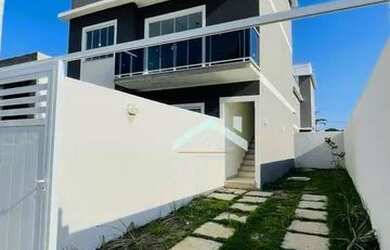 Imagem: A casa possui 2 Dormitórios, 2 Banheiros, 2 Vagas na garagem