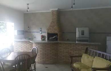 Imagem: A casa possui 3 Dormitórios, 4 Banheiros, 4 Vagas na garagem