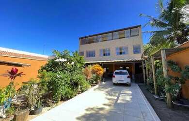 Imagem: A casa possui 3 Dormitórios, 4 Banheiros, 4 Vagas na garagem