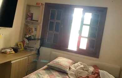 Imagem: A casa possui 3 Dormitórios, 2 Banheiros, 2 Vagas na garagem