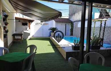 Imagem: A casa possui 3 Dormitórios, 2 Banheiros, 2 Vagas na garagem