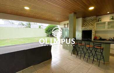 Imagem: A casa possui 3 Dormitórios, 5 Banheiros, 4 Vagas na garagem