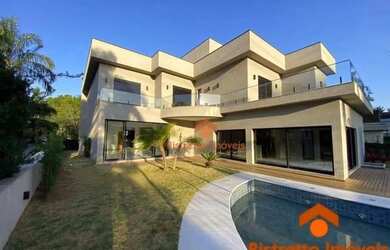 Imagem: A casa em condomínio possui 5 Dormitórios, 5 Banheiros, 5