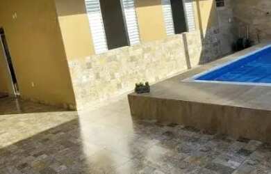 Imagem: A casa possui 3 Dormitórios e está localizado em Cidade da