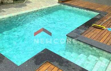 Imagem: A casa possui 3 Dormitórios, 5 Banheiros, 5 Vagas na garagem