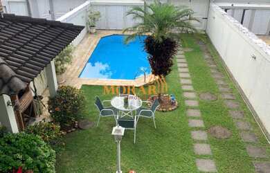 Imagem: A casa em condomínio possui 4 Dormitórios, 4 Banheiros, 2