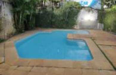 Imagem: A casa possui 4 Dormitórios, 4 Banheiros, 3 Vagas na garagem