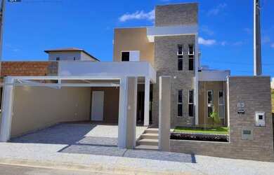 Imagem: A casa possui 3 Dormitórios, 3 Banheiros, 2 Vagas na garagem