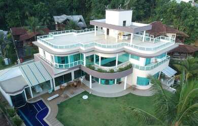 Imagem: A casa em condomínio para alugar possui 5 Dormitórios, 5 Banheiros