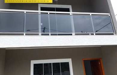 Imagem: A casa possui 2 Dormitórios, 3 Banheiros, 1 Vaga na garagem