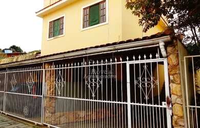 Imagem: A casa possui 2 Dormitórios, 1 Banheiro, 1 Vaga na garagem