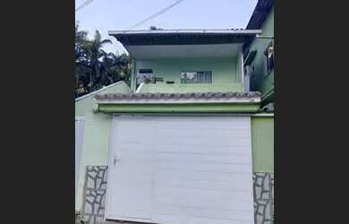 Imagem: A casa possui 2 Dormitórios, 2 Banheiros, 1 Vaga na garagem