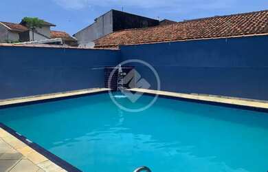 Imagem: A casa possui 3 Dormitórios, 4 Banheiros, 4 Vagas na garagem