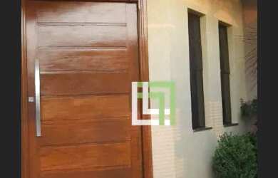 Imagem: A casa possui 3 Dormitórios, 2 Banheiros, 4 Vagas na garagem