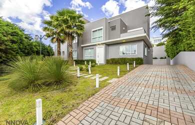 Imagem: A casa possui 5 Dormitórios, 5 Banheiros, 5 Vagas na garagem