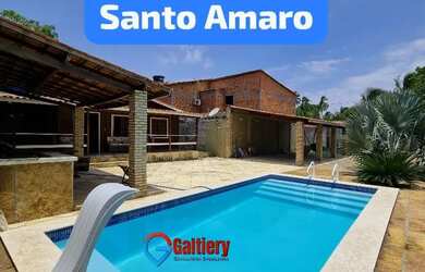 Imagem: A casa possui 3 Dormitórios, 2 Banheiros, 5 Vagas na garagem