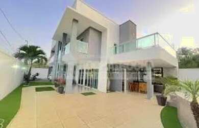 Imagem: A casa possui 3 Dormitórios, 3 Banheiros, 2 Vagas na garagem