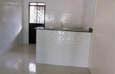 Imagem: A casa possui 2 Dormitórios, 1 Banheiro, 2 Vagas na garagem