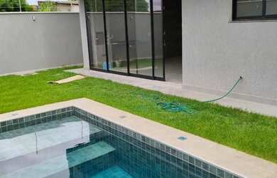 Imagem: A casa possui 3 Dormitórios, 5 Banheiros, 3 Vagas na garagem