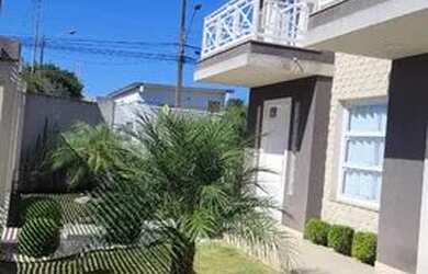 Imagem: A casa possui 3 Dormitórios, 3 Banheiros, 2 Vagas na garagem