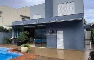 Imagem: A casa em condomínio possui 4 Dormitórios, 5 Banheiros, 4