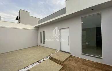 Imagem: A casa possui 3 Dormitórios, 3 Banheiros, 2 Vagas na garagem