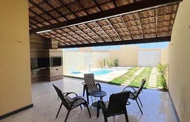 Imagem: A casa possui 3 Dormitórios, 3 Vagas na garagem e está localizado