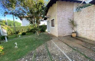 Imagem: A casa em condomínio possui 4 Dormitórios, 4 Banheiros, 4