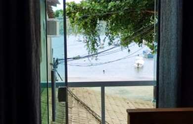 Imagem: A casa possui 2 Dormitórios e está localizado em Paraty