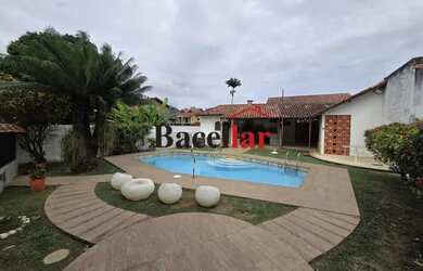 Imagem: A casa em condomínio possui 3 Dormitórios, 4 Banheiros, 2