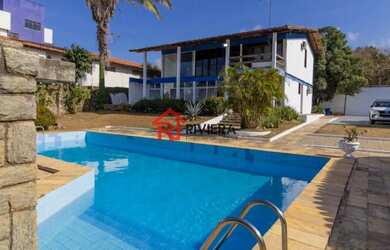 Imagem: A casa possui 4 Dormitórios, 3 Banheiros, 5 Vagas na garagem