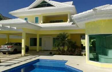 Imagem: A casa possui 4 Dormitórios, 4 Banheiros, 3 Vagas na garagem