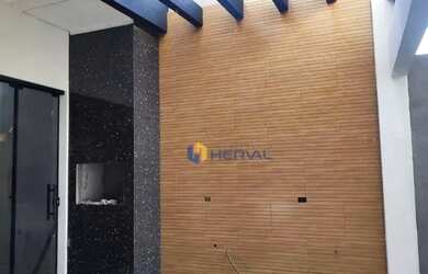 Imagem: A casa possui 3 Dormitórios, 2 Banheiros, 4 Vagas na garagem