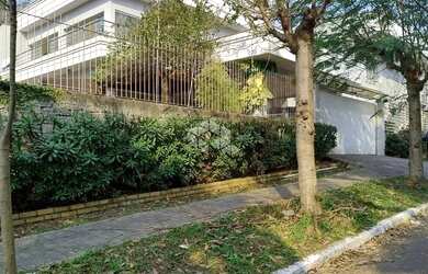 Imagem: A casa possui 4 Dormitórios, 4 Banheiros, 2 Vagas na garagem