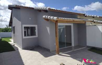 Imagem: A casa possui 2 Dormitórios, 2 Banheiros, 3 Vagas na garagem