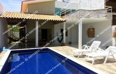 Imagem: A casa possui 4 Dormitórios, 5 Banheiros, 3 Vagas na garagem