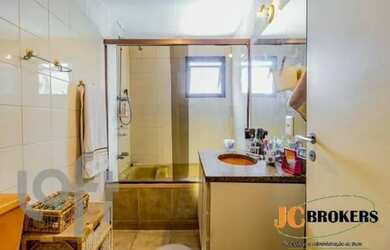 Imagem 10: Apartamento com 95 m², 3 Dormitórios sendo 1 suíte com banheira, Sala com dois ambientes