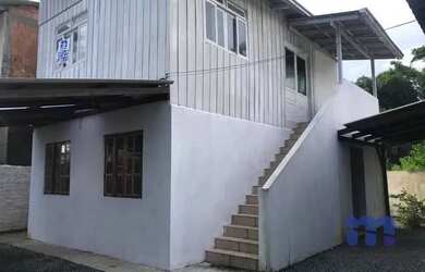 Imagem: A casa possui 2 Dormitórios, 1 Banheiro, 1 Vaga na garagem