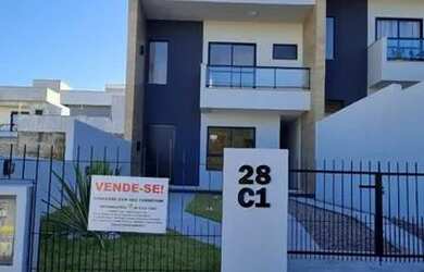 Imagem: A casa possui 3 Dormitórios, 3 Banheiros, 2 Vagas na garagem