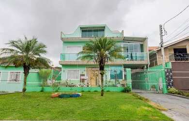 Imagem: A casa possui 5 Dormitórios, 5 Banheiros, 5 Vagas na garagem