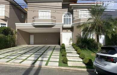 Imagem: A casa em condomínio possui 4 Dormitórios, 5 Banheiros, 4