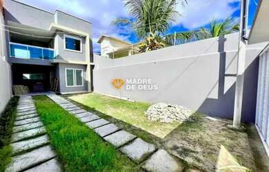 Imagem: A casa possui 2 Dormitórios, 5 Banheiros, 3 Vagas na garagem