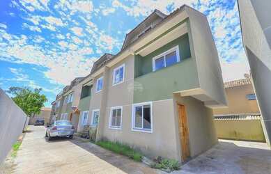 Imagem: A casa possui 3 Dormitórios, 2 Banheiros, 2 Vagas na garagem