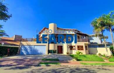 Imagem: A casa em condomínio possui 5 Dormitórios, 5 Banheiros, 5