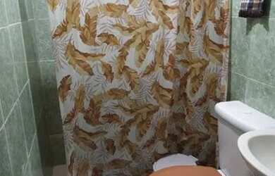 Imagem: A casa possui 3 Dormitórios e 1 Vaga na garagem e está localizado