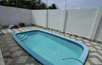 Imagem: A casa possui 2 Dormitórios e 2 Banheiros e está localizado