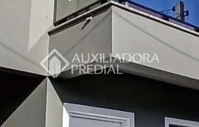 Imagem: A casa possui 2 Dormitórios, 3 Banheiros, 2 Vagas na garagem